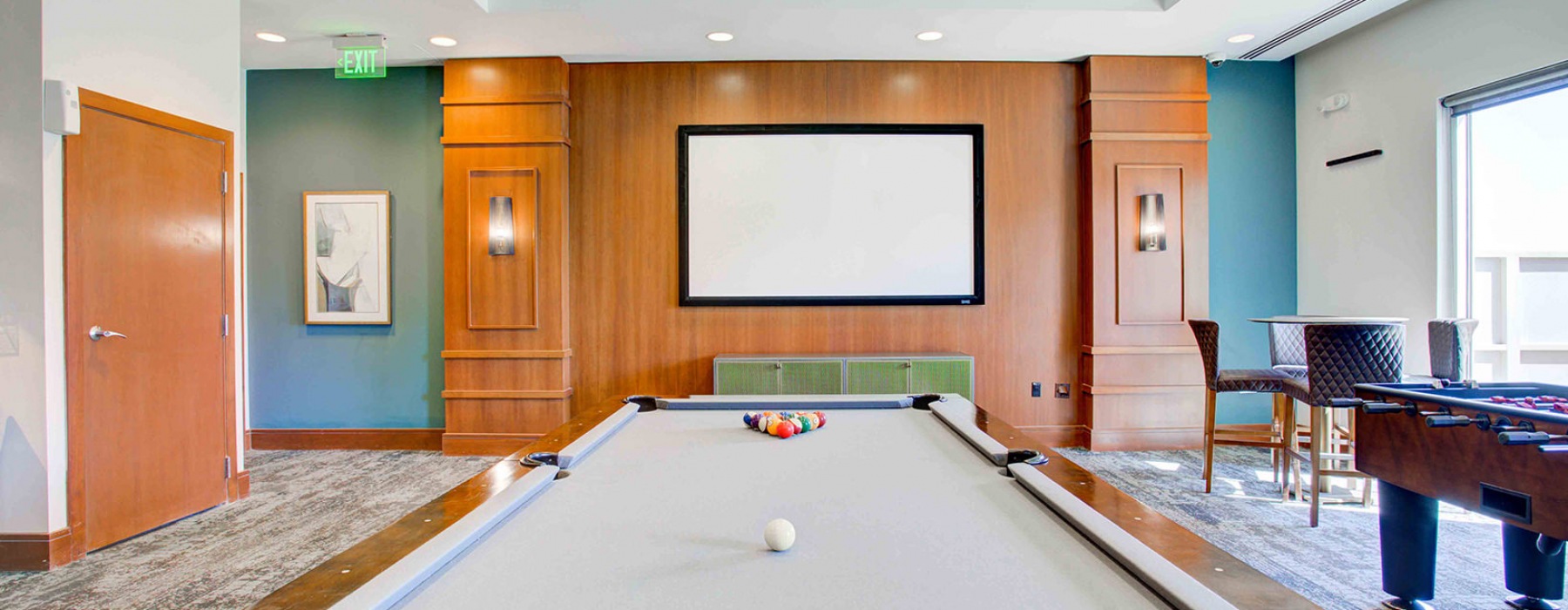 Large game room with games and seating 