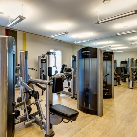 Fitness Center	 fitness center with ample lighting